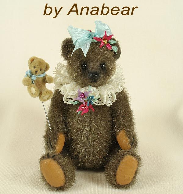 Loren is a Collectible Bear standing 2 3/4 tall.