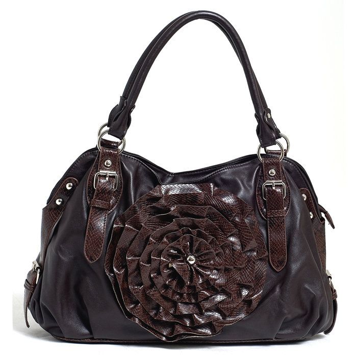 Look good anywhere you go with this stylish handbag made of soft, faux