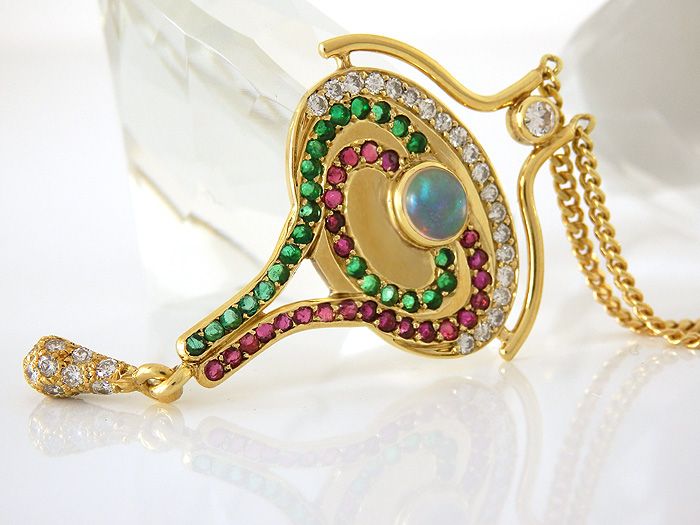 Collier in 585/  Gelbgold mit Opal, Rubinen, Smaragden + Diamanten